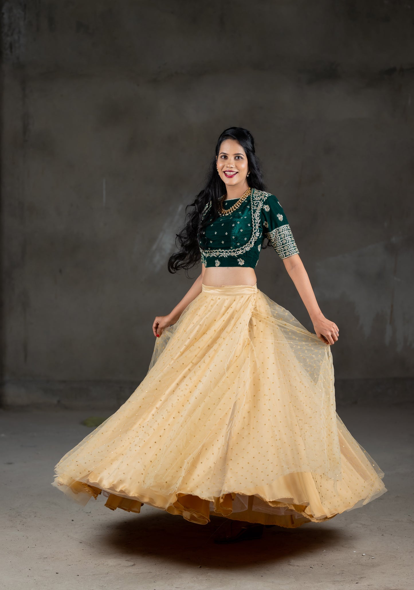 Green beautiful velvet blouse with embroidery work and cream skirt