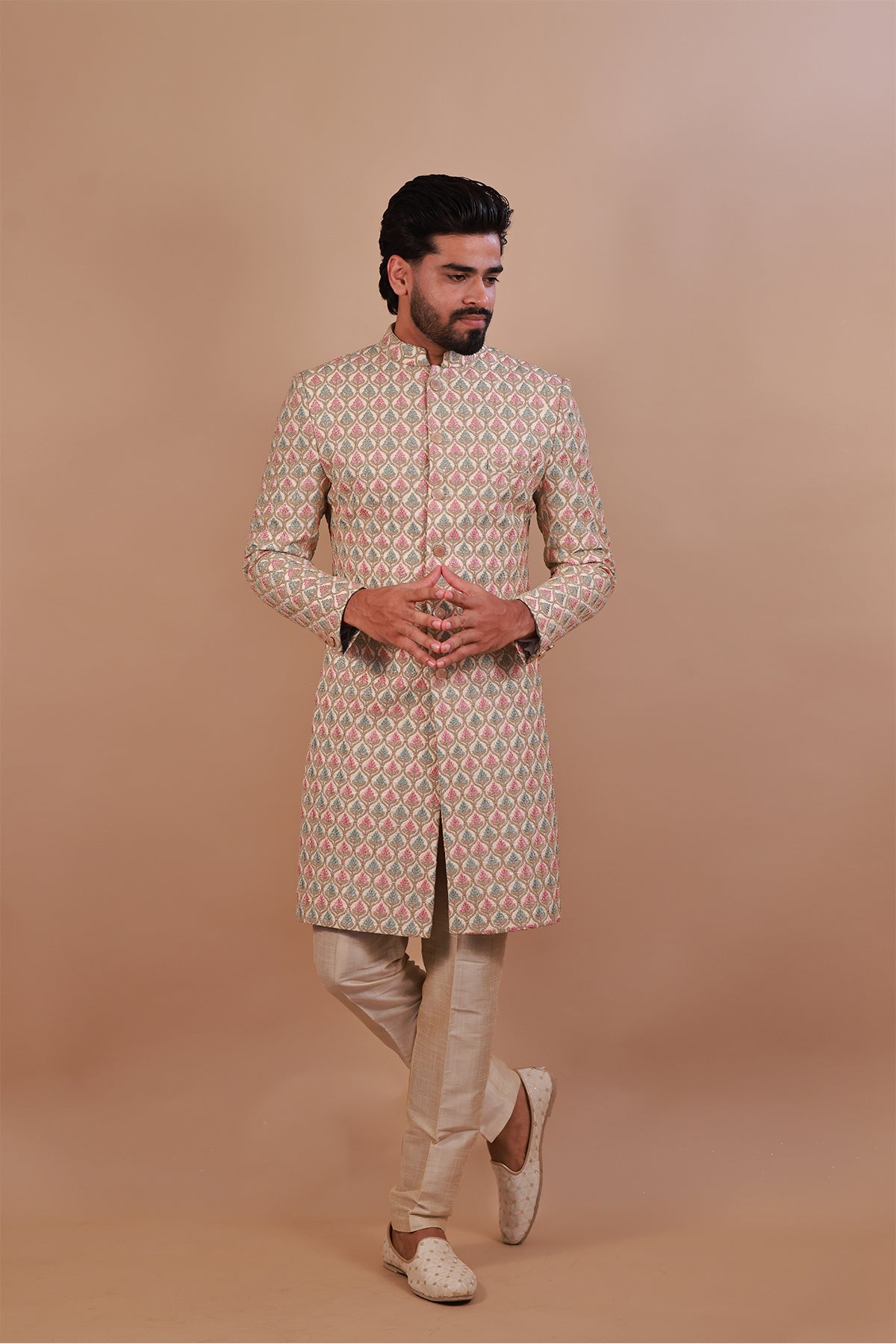 Groom's White Sherwani with Vibrant Pink & Gold Thread Work