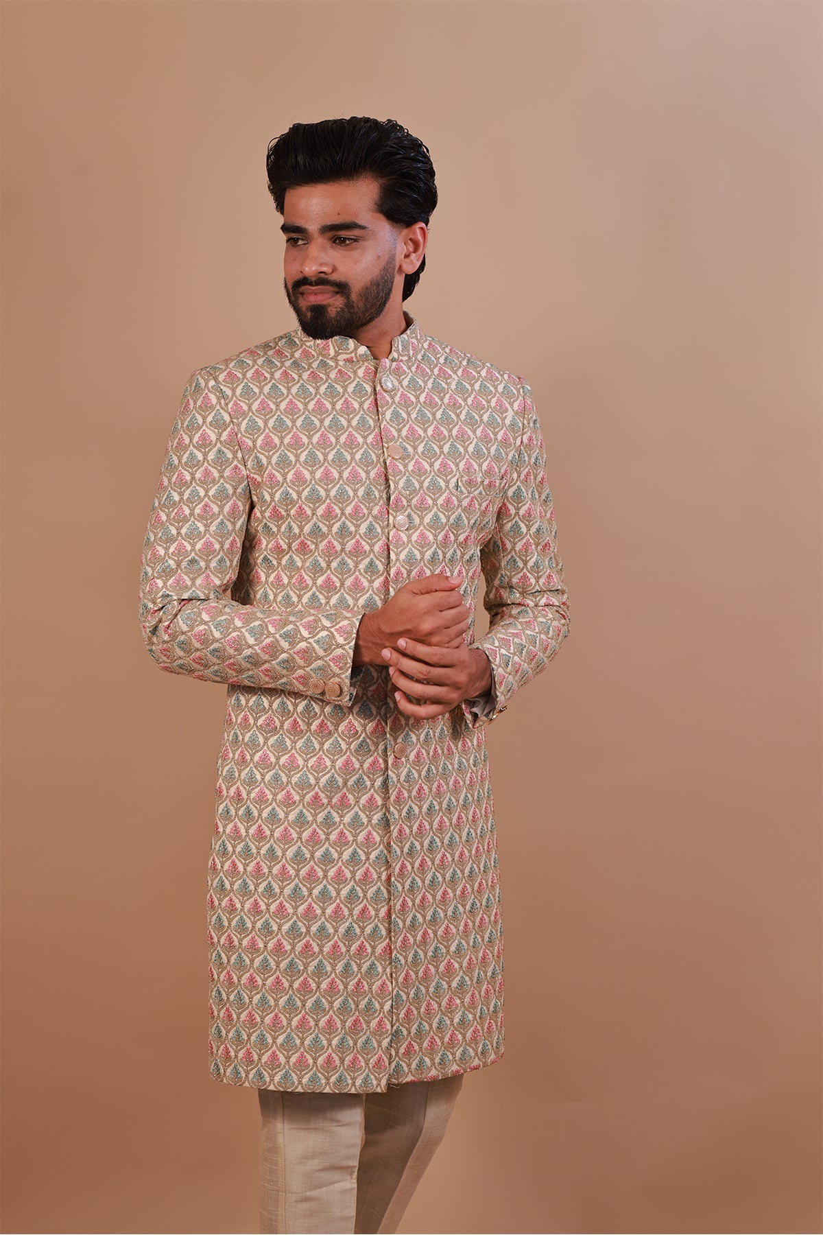 Groom's White Sherwani with Vibrant Pink & Gold Thread Work
