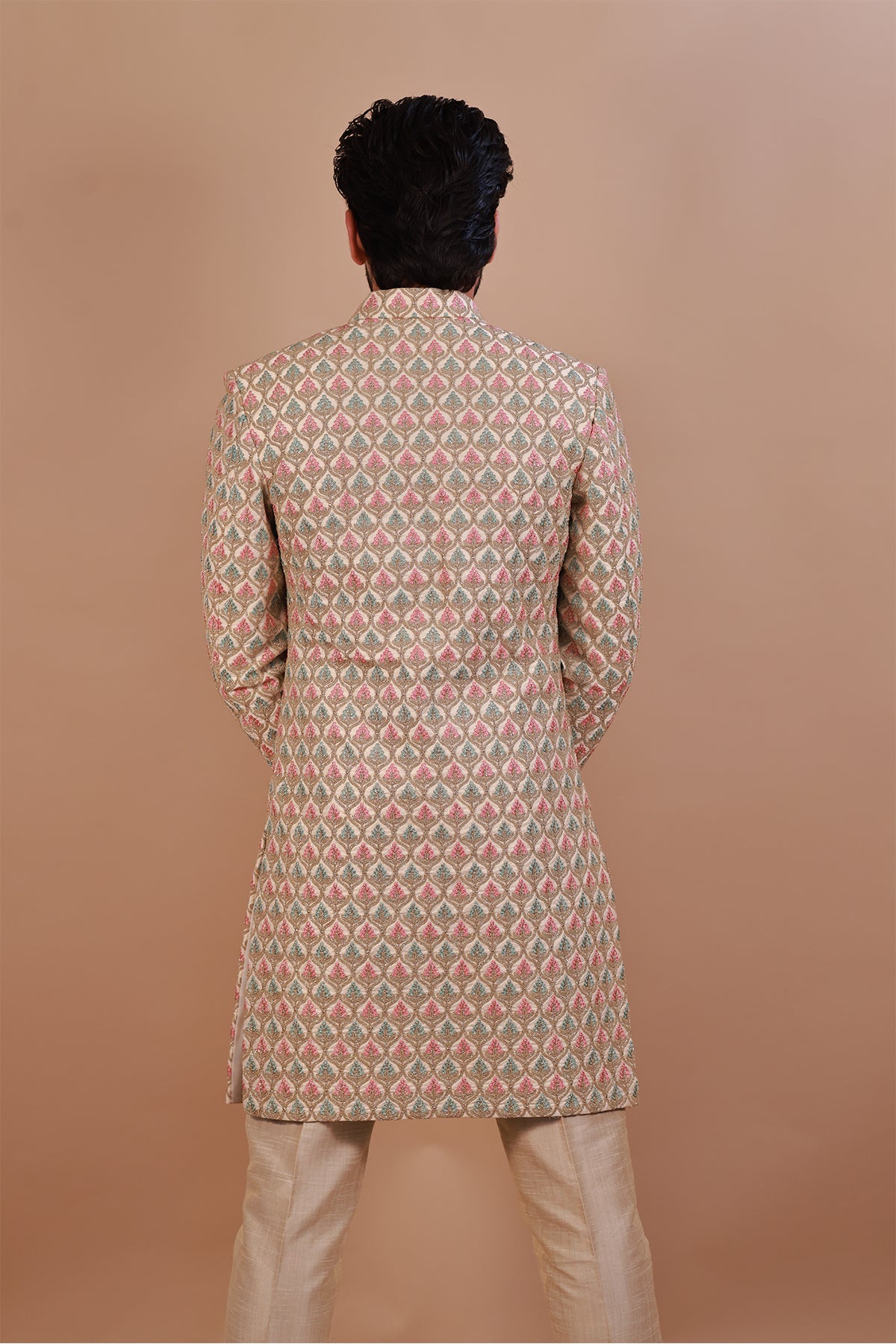 Groom's White Sherwani with Vibrant Pink & Gold Thread Work