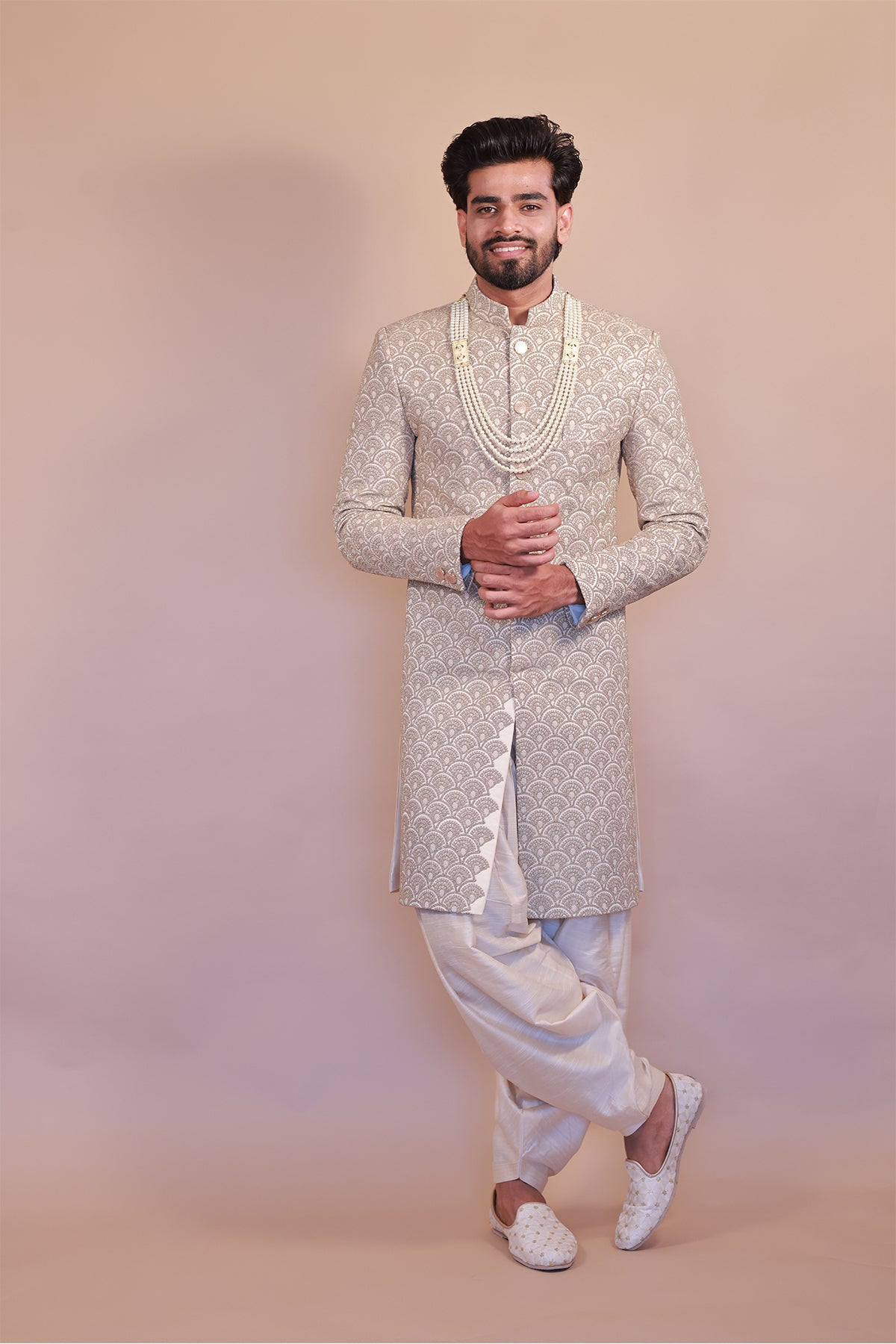 Cream Sherwani with Intricate Pink & Gold Embroidery for Grooms