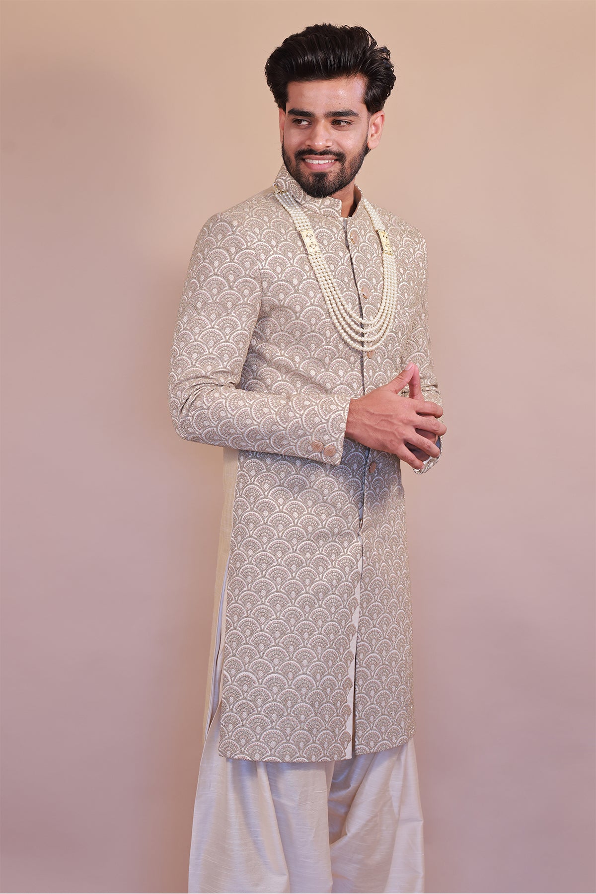 Cream Sherwani with Intricate Pink & Gold Embroidery for Grooms