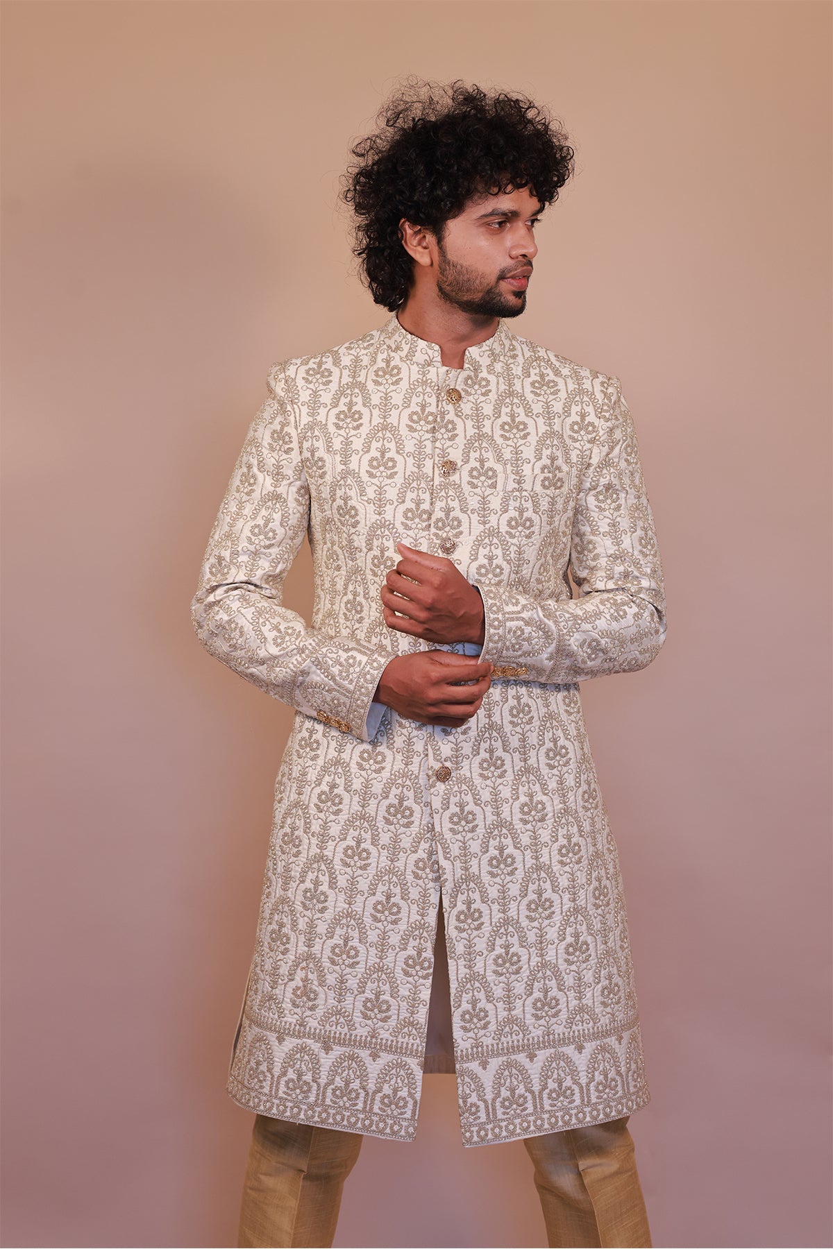 Traditional Cream Sherwani with Stunning Green & Gold Embroidery