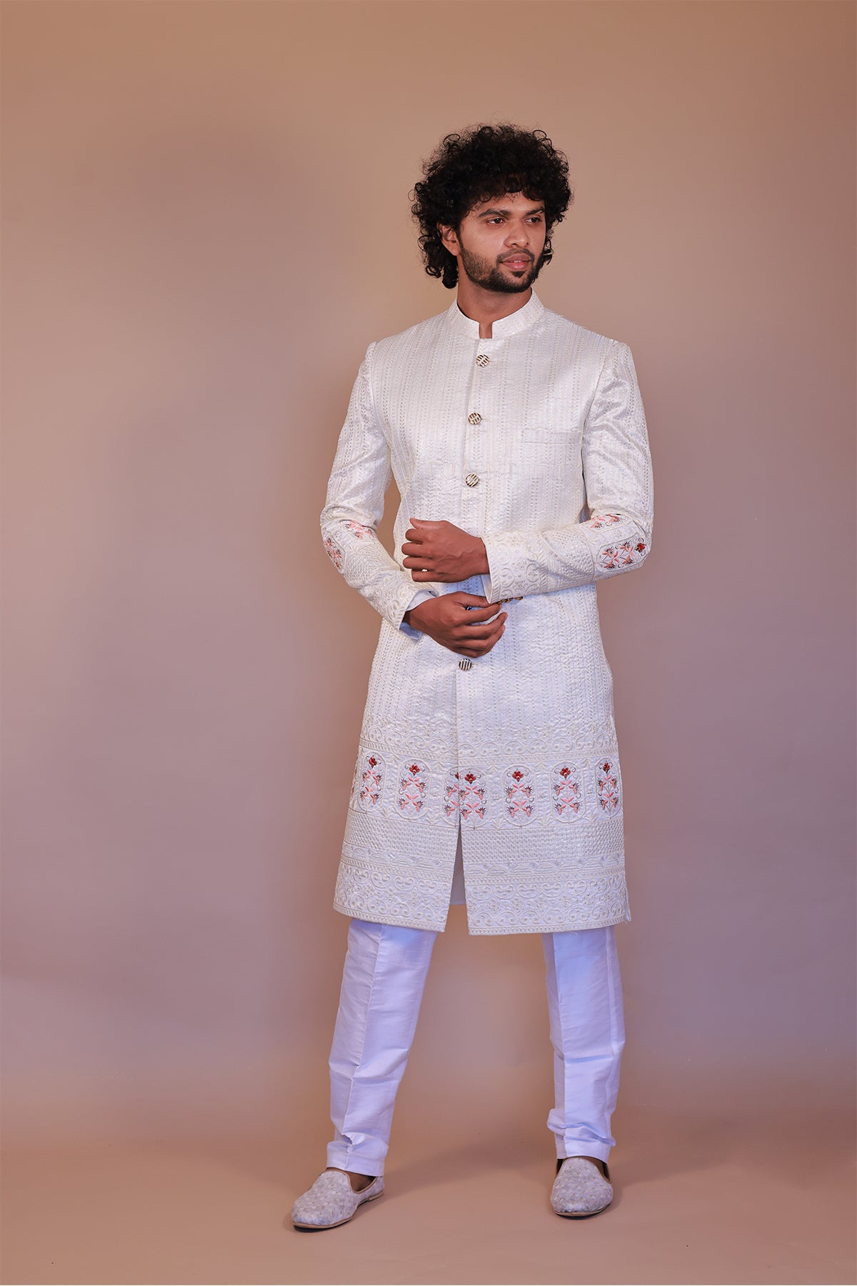 White Sherwani for Groom with Rich Orange & Maroon Thread Embroidery