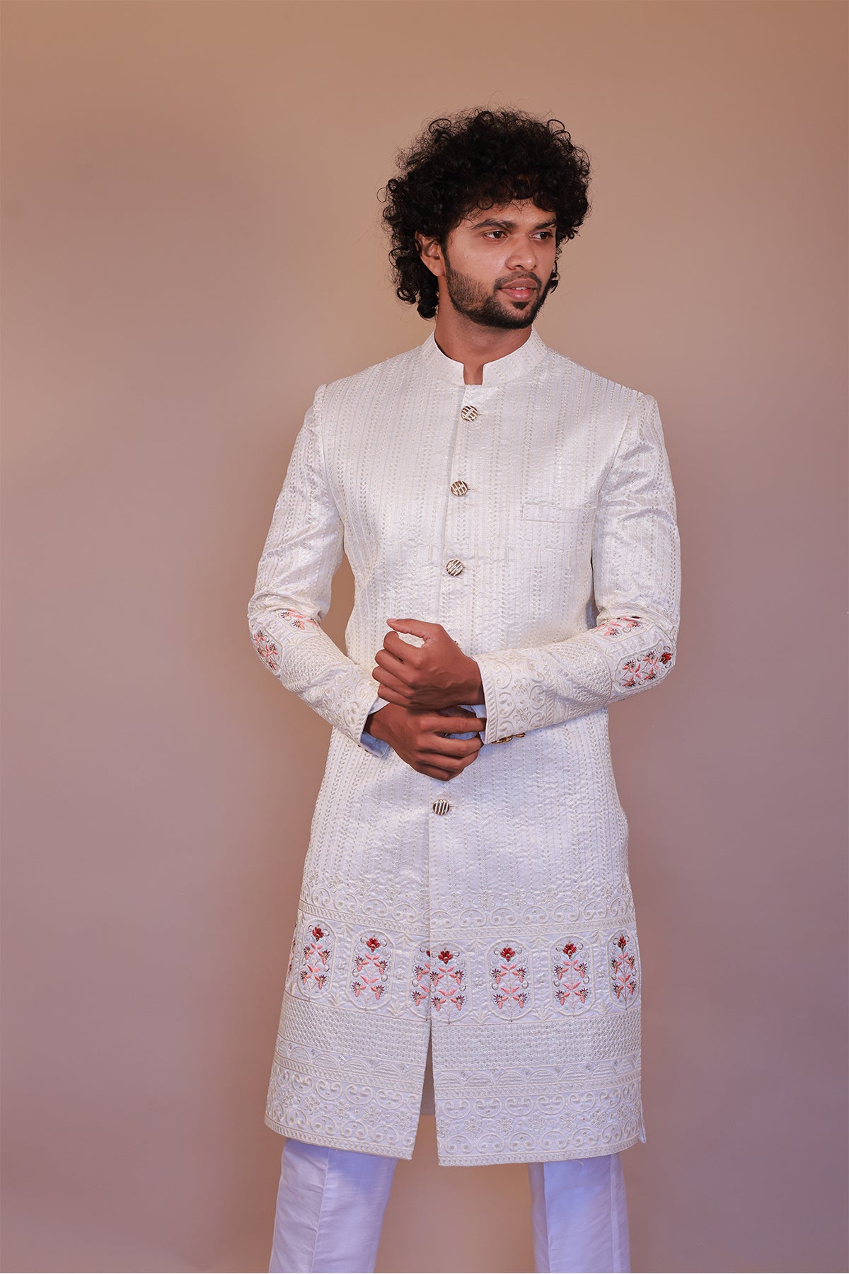 White Sherwani for Groom with Rich Orange & Maroon Thread Embroidery