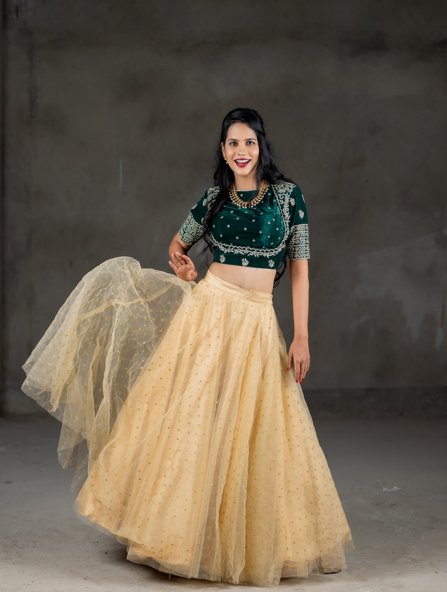 Green beautiful velvet blouse with embroidery work and cream skirt