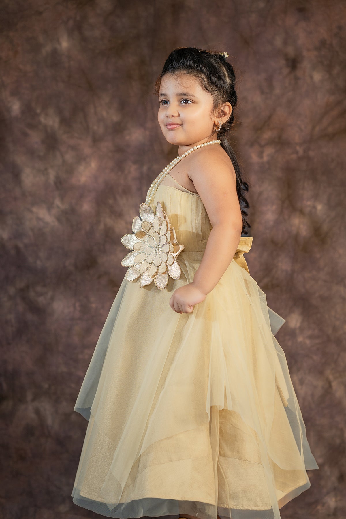 Beige one shoulder gown for kid
