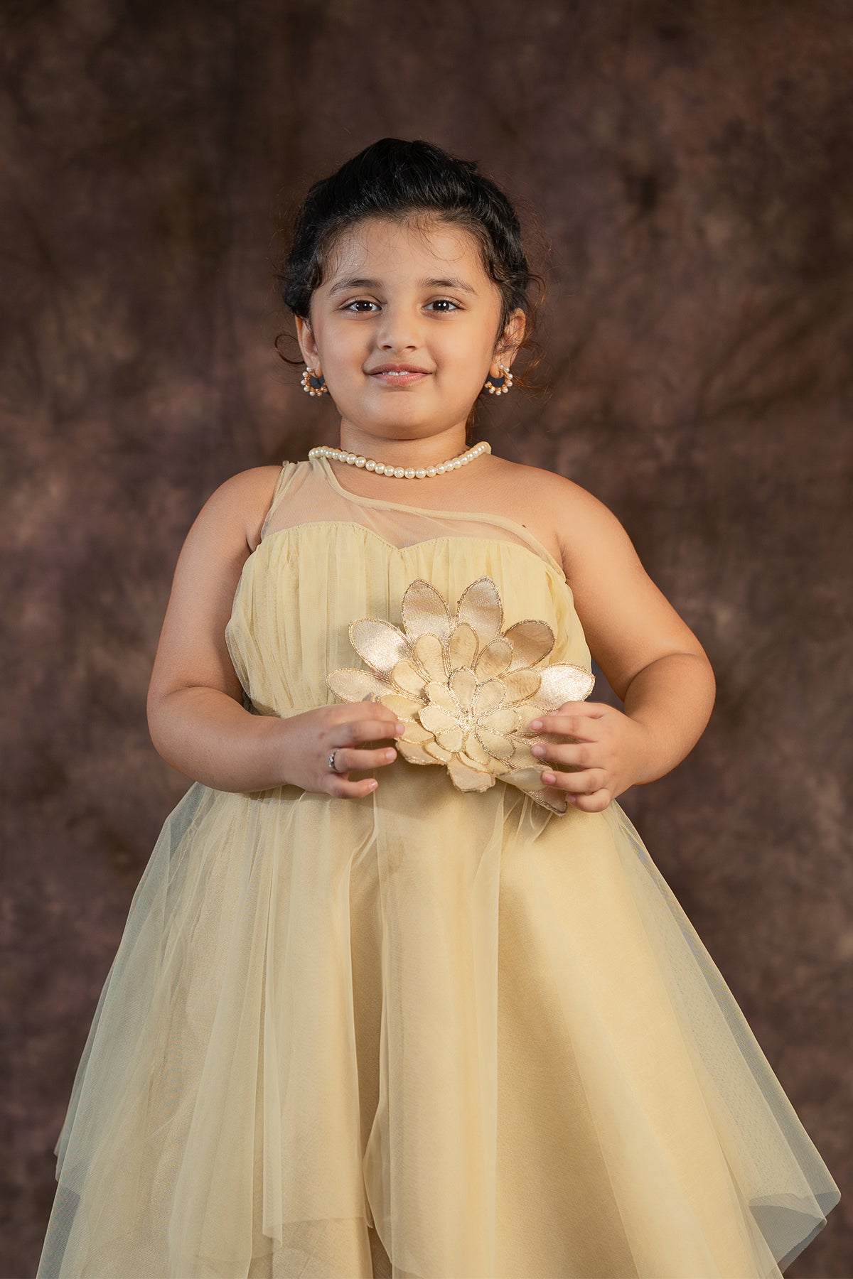Beige one shoulder gown for kid