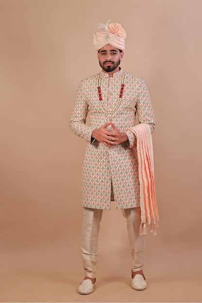 Groom's White Sherwani with Vibrant Pink & Gold Thread Work