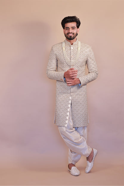 Cream Sherwani with Intricate Pink & Gold Embroidery for Grooms