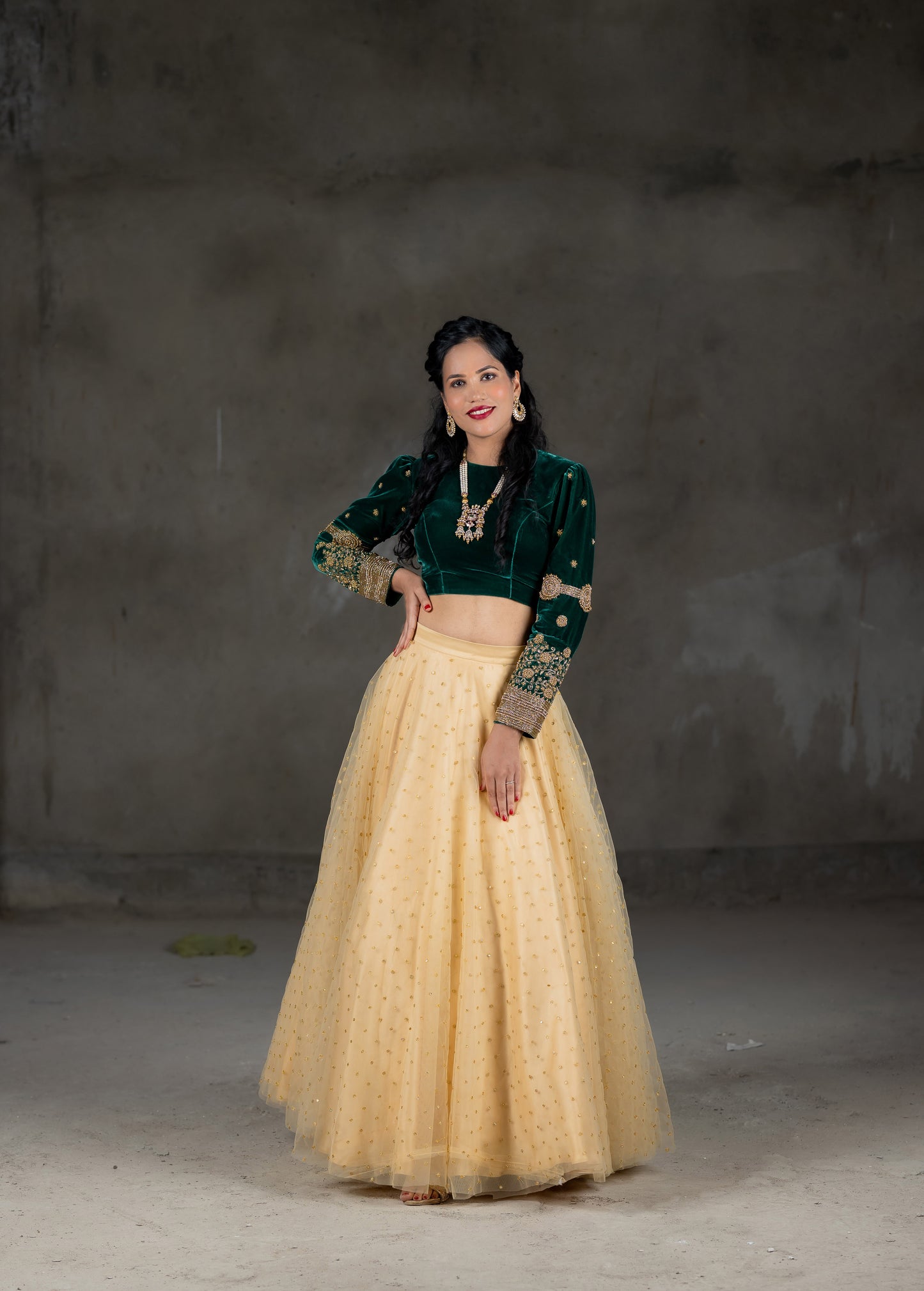 Green velvet crop top embroidery work and cream skirt